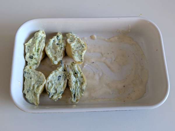 Conchiglioni diisi dengan ricotta, cukini, dan lemon: krim dan au gratin di dalam oven - Persiapan langkah 7