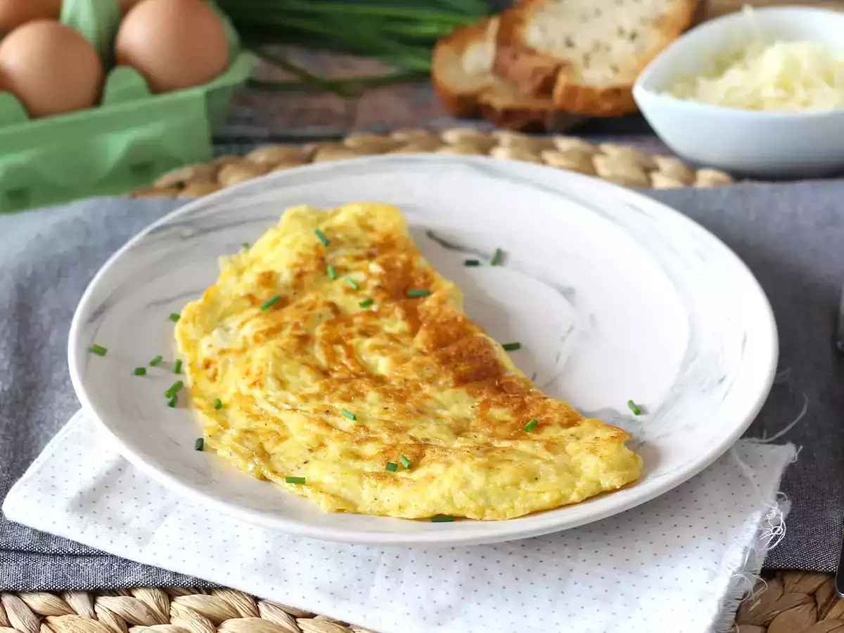 Omelet keju, resep cepat saji yang siap dalam 5 menit! - foto 4